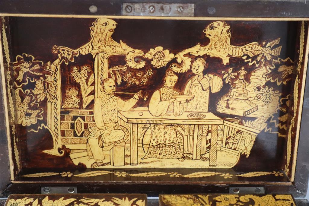 A Regency penwork tea caddy, width 9.5in height 7in.
